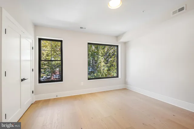 an empty room with windows