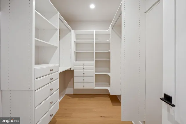 a view of an empty walk in closet