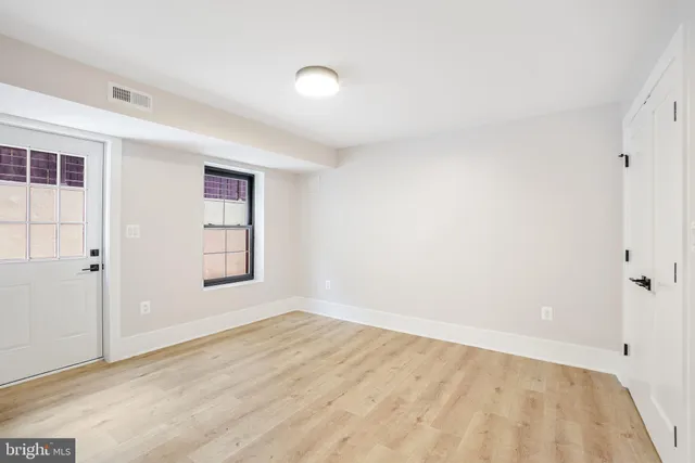 an empty room with windows