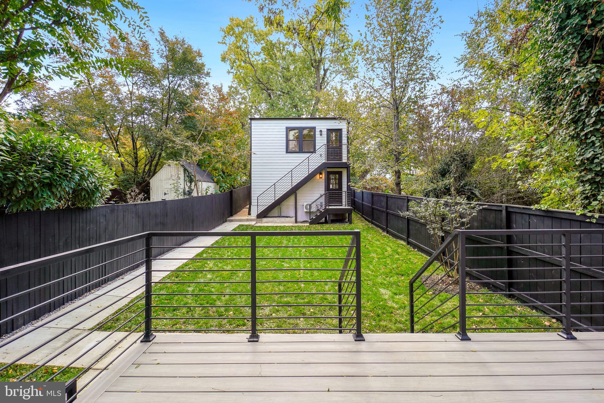 4414 Harrison Street Northwest Washington, DC 20015 - Photo 41 of 46 a view of a deck with a small yard