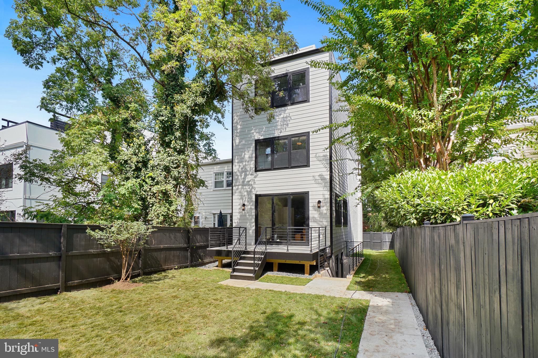 4414 Harrison Street Northwest Washington, DC 20015 - Photo 45 of 46 a view of a house with backyard and sitting area