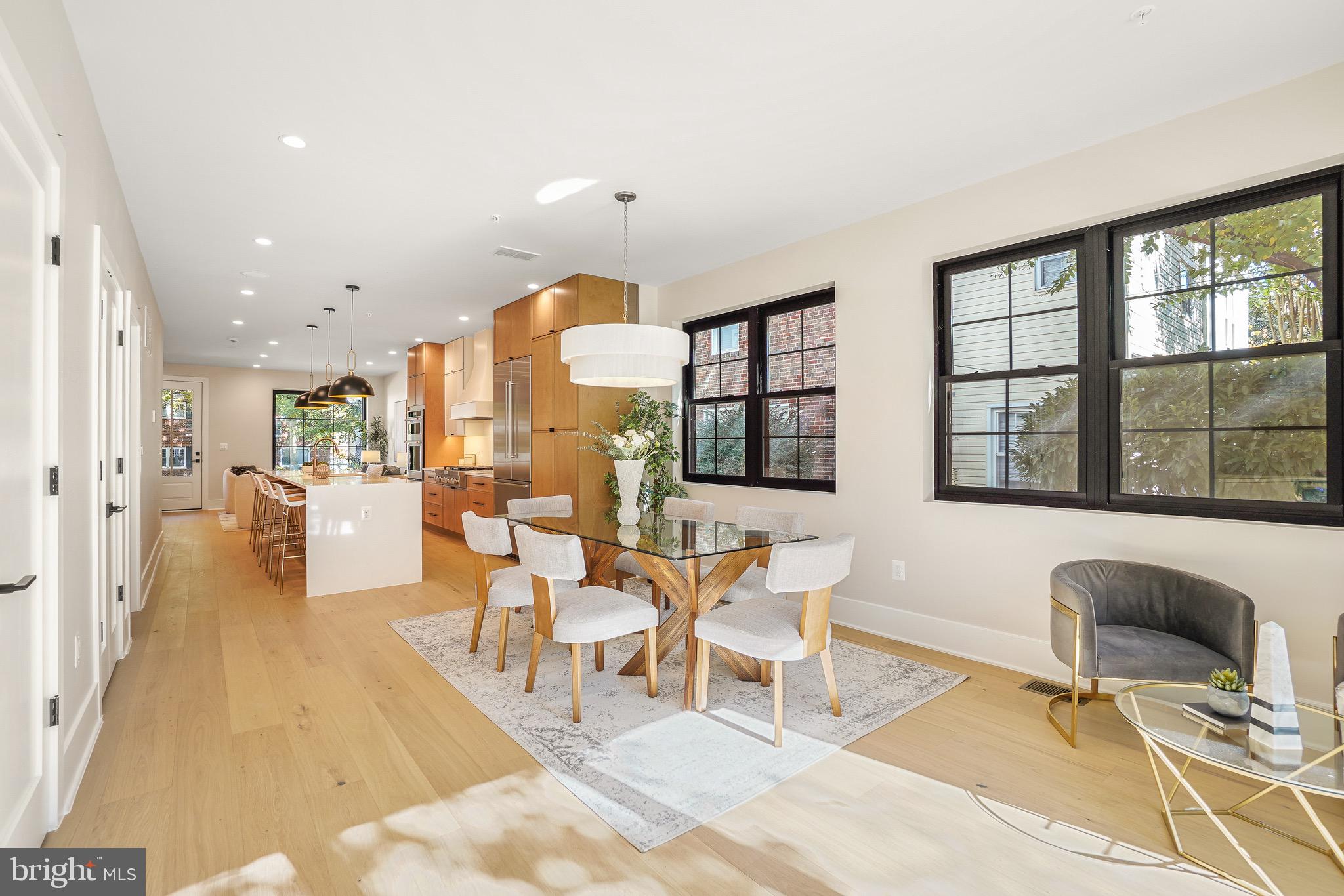 4414 Harrison Street Northwest Washington, DC 20015 - Photo 10 of 46 a living room with furniture and a large window