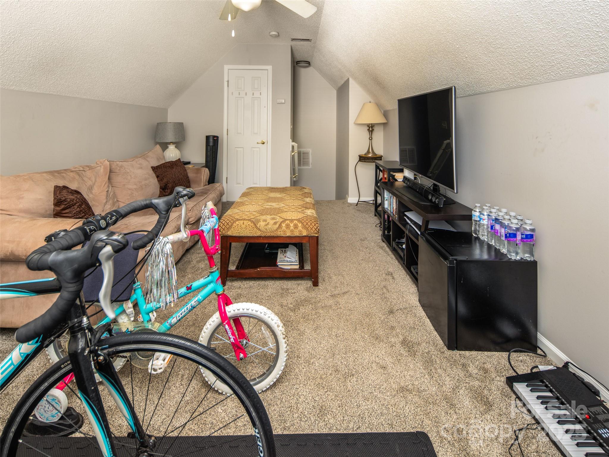 141 Black River Road Fletcher, NC 28732 - Photo 22 of 32 a view of a room with gym equipment