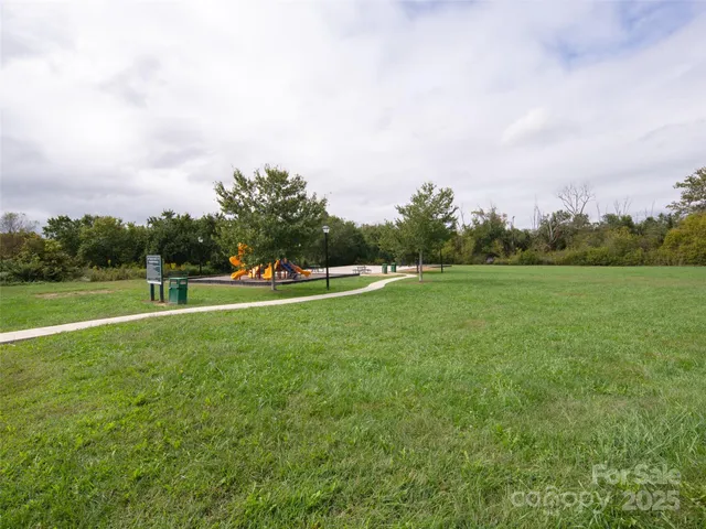 a view of a golf course with a lake