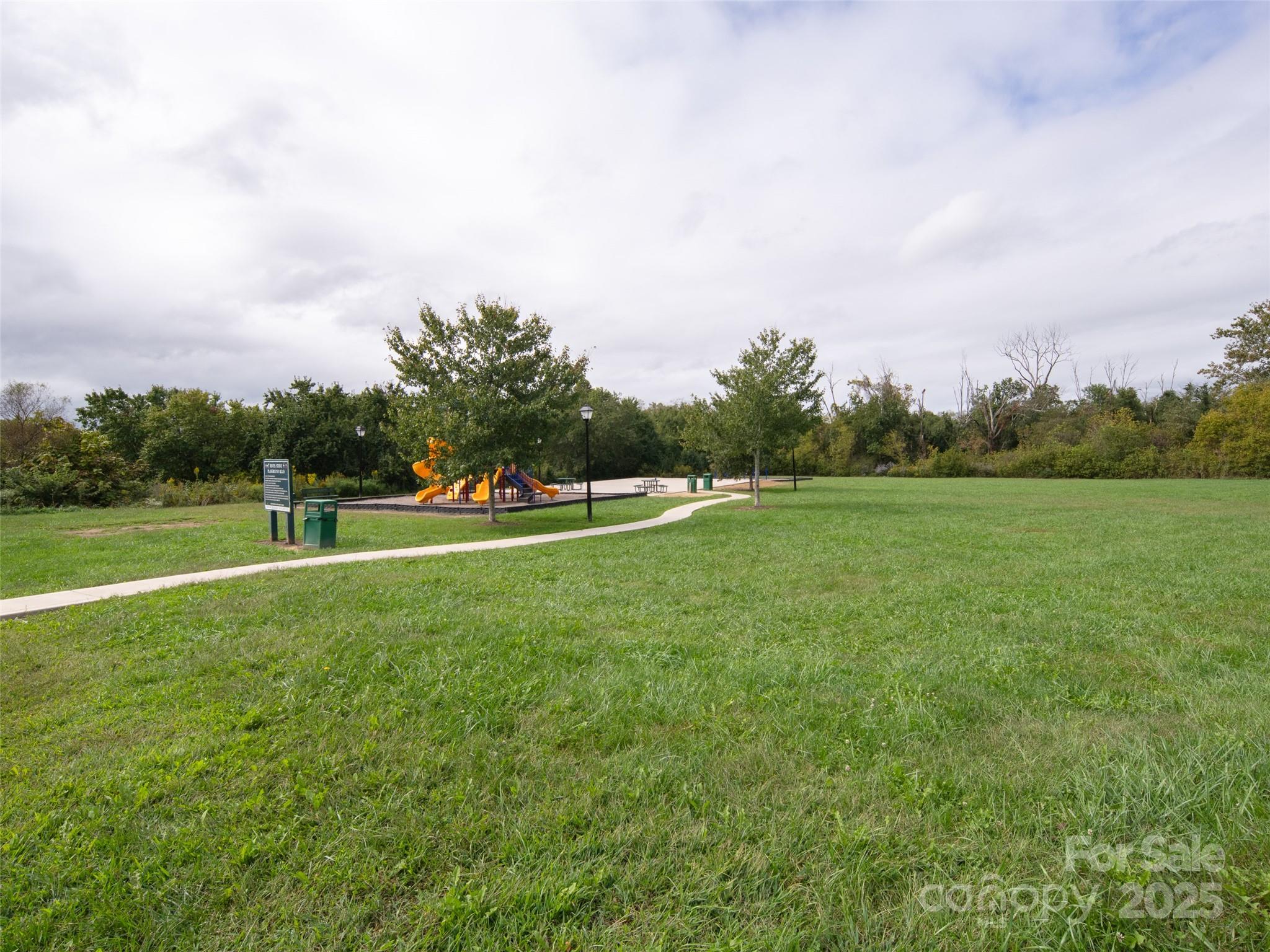 141 Black River Road Fletcher, NC 28732 - Photo 28 of 32 a view of a golf course with a lake