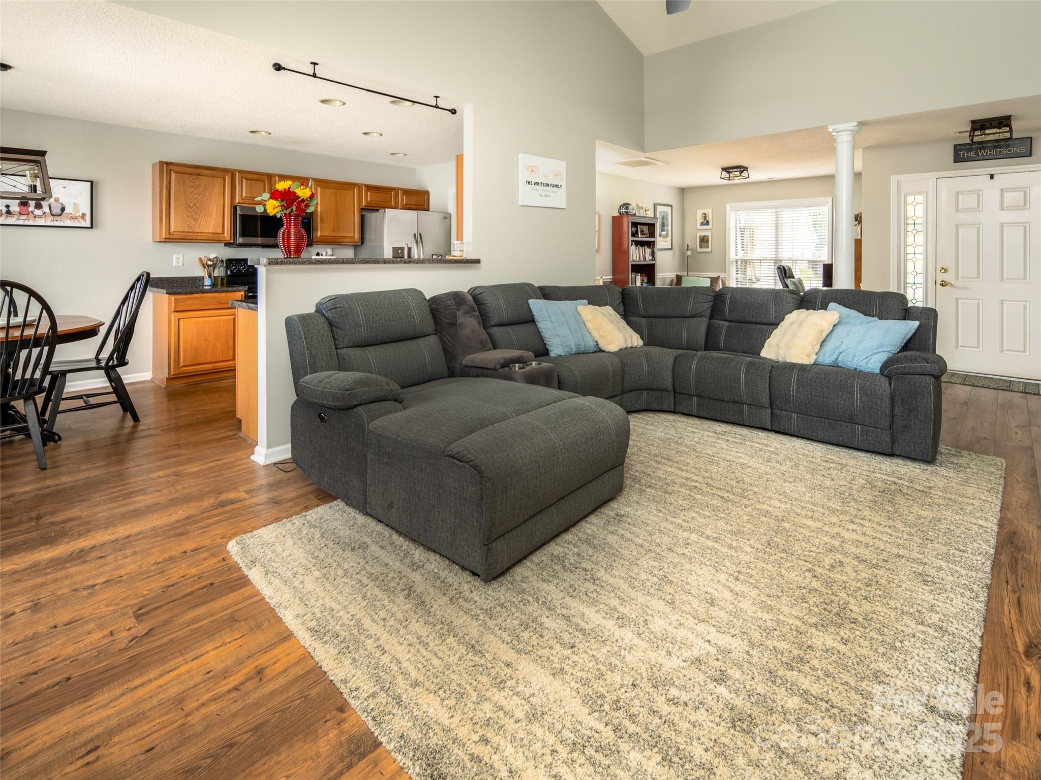 141 Black River Road Fletcher, NC 28732 - Photo 5 of 32 a living room with furniture a rug and a flat screen tv