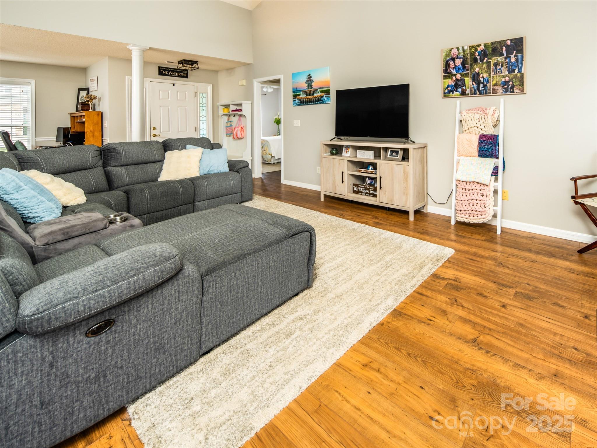 141 Black River Road Fletcher, NC 28732 - Photo 7 of 32 a living room with furniture and a flat screen tv