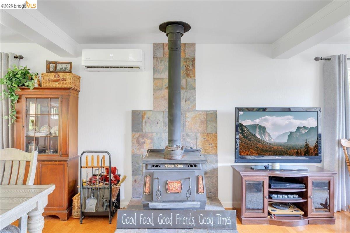 18475 Hershey Road East Tuolumne, CA 95379 - Photo 17 of 38 a living room with furniture and a painting on the wall