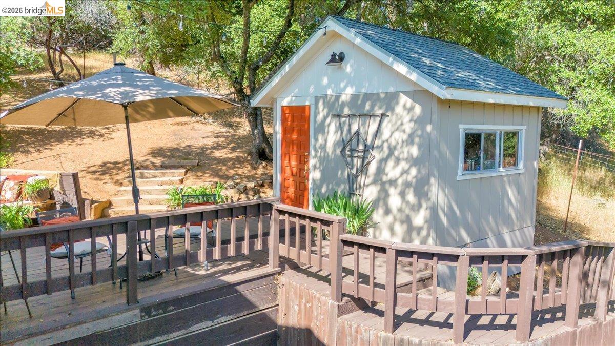 18475 Hershey Road East Tuolumne, CA 95379 - Photo 29 of 38 a view of wooden house with a yard