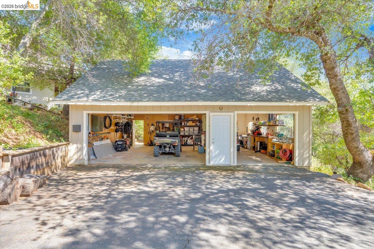 18475 Hershey Road East Tuolumne, CA 95379 - Photo 31 of 38 a view of a house with a patio