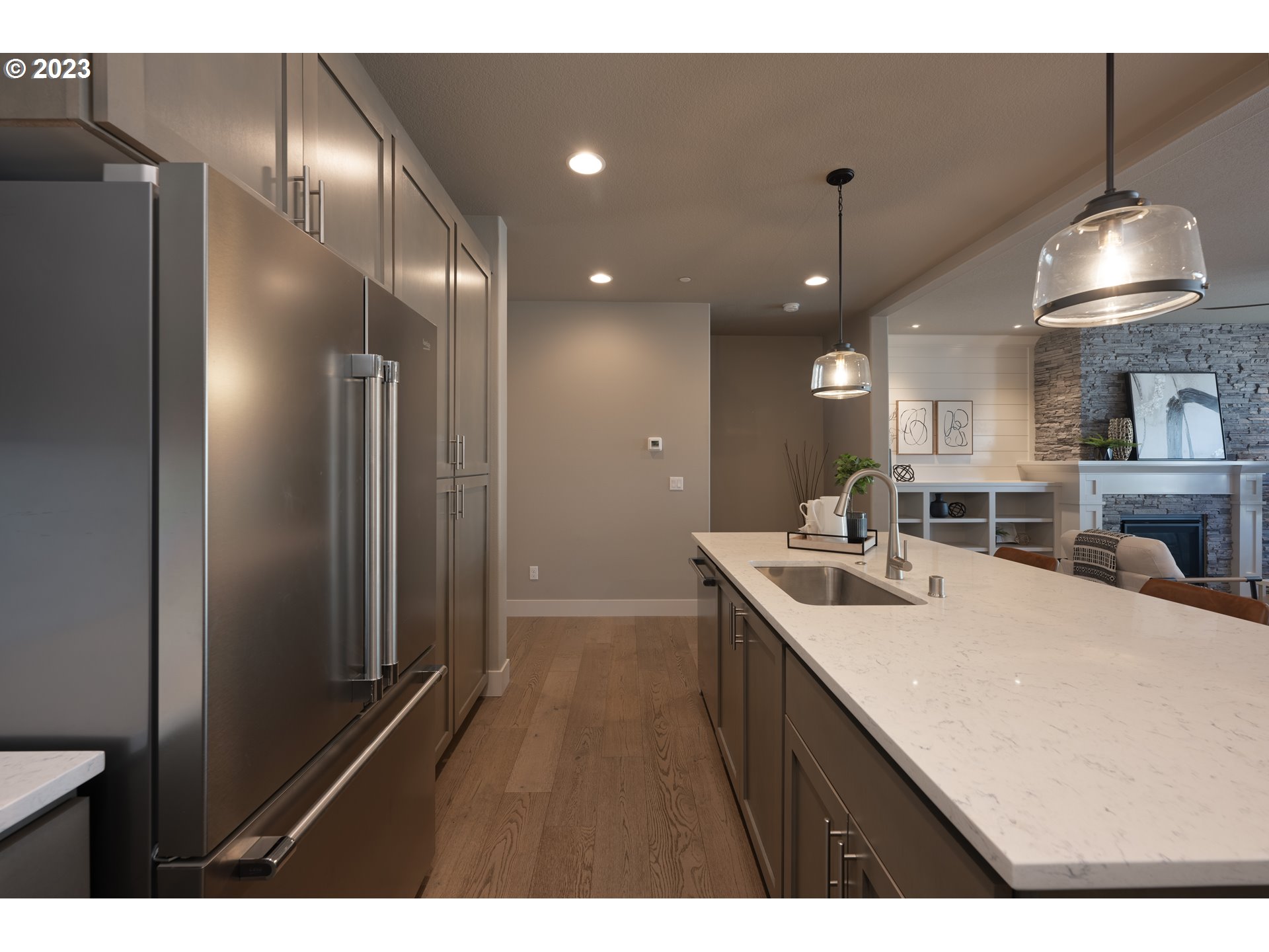 3743 Northwest 64th Avenue Camas, WA 98607 - Photo 16 of 35 a kitchen with a sink and chandelier