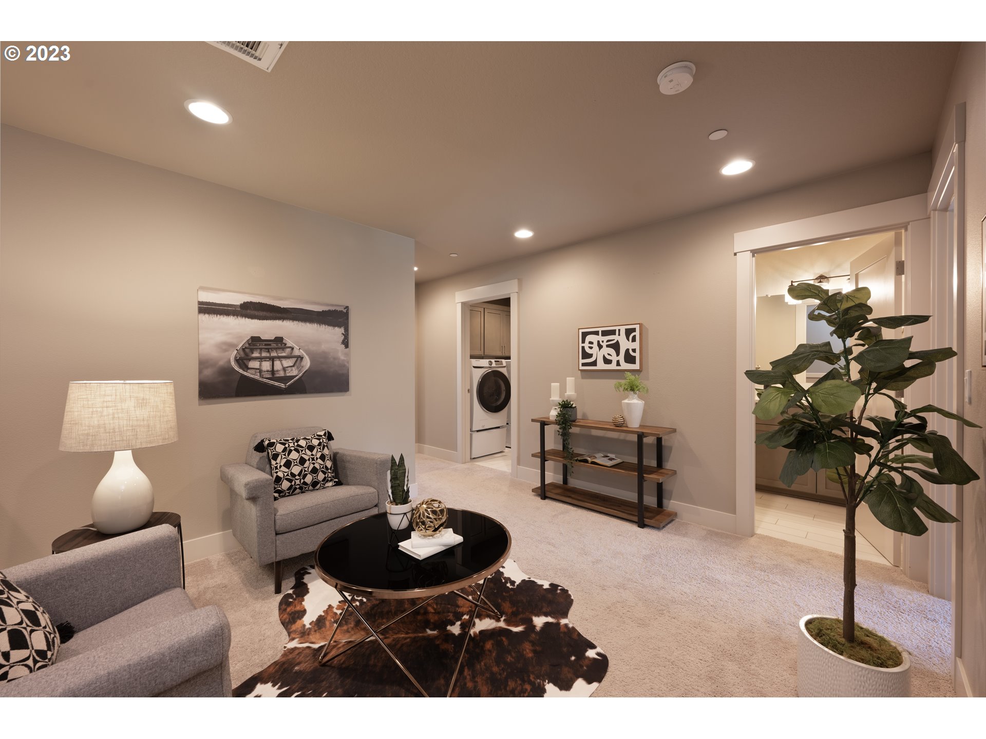 3743 Northwest 64th Avenue Camas, WA 98607 - Photo 19 of 35 a living room with furniture and flowers