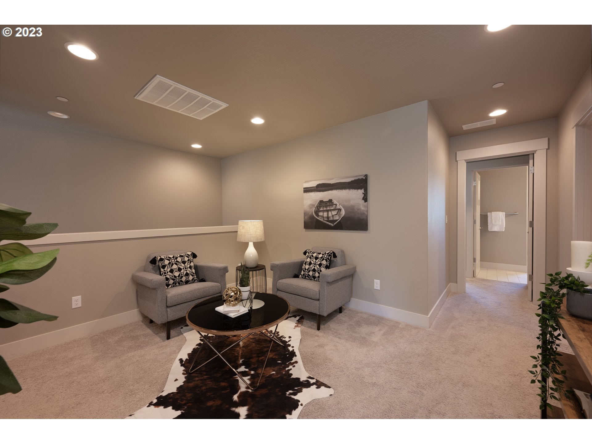 3743 Northwest 64th Avenue Camas, WA 98607 - Photo 20 of 35 a living room with furniture and a wooden floor