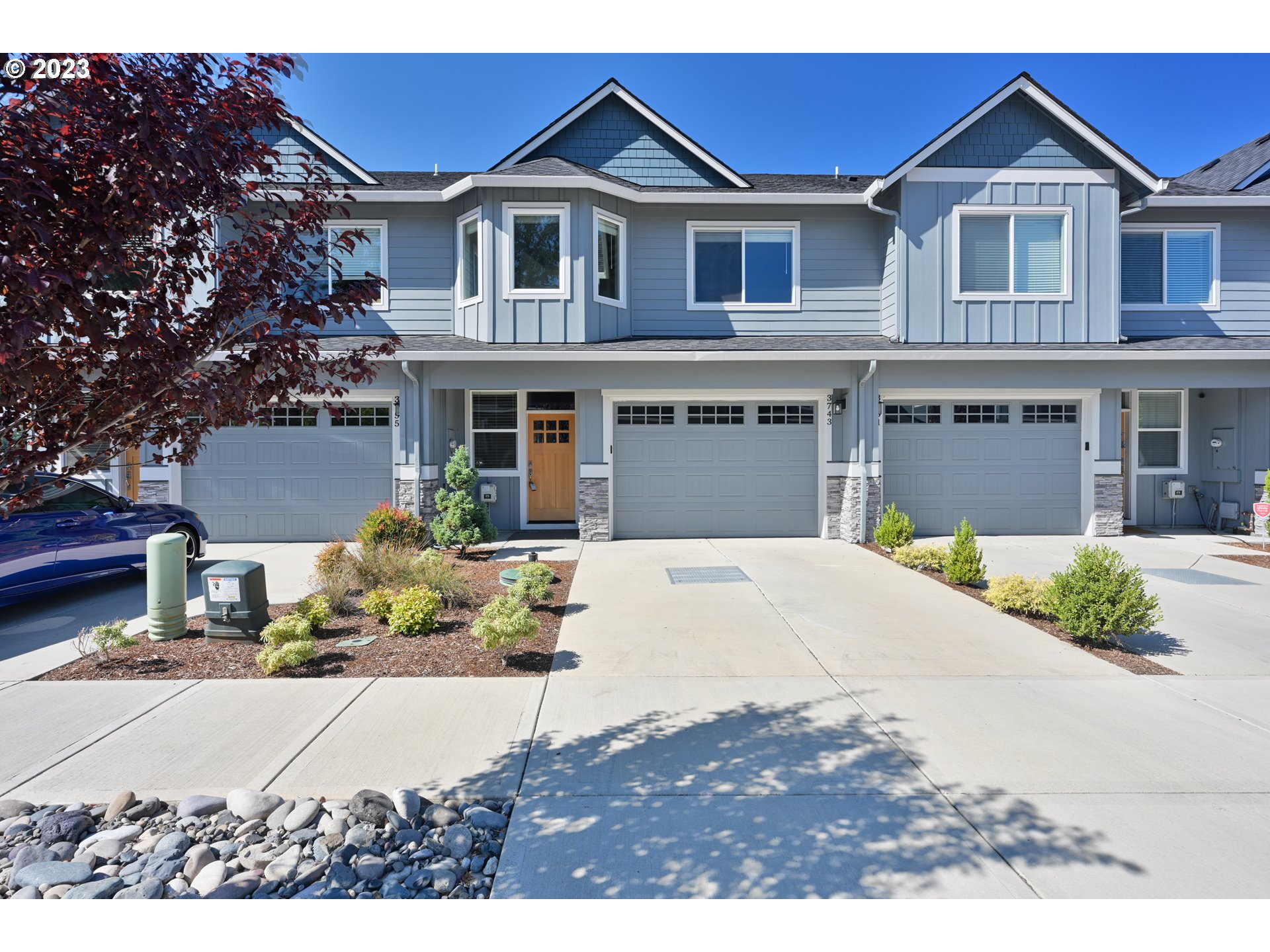 3743 Northwest 64th Avenue Camas, WA 98607 - Photo 2 of 35 a front view of a house with a yard
