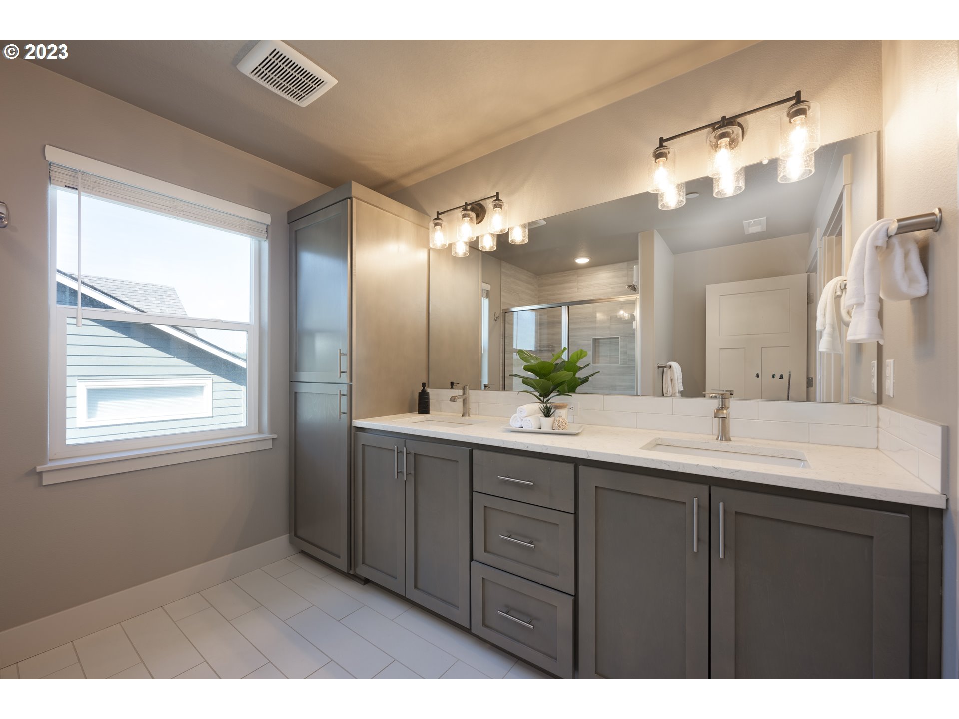 3743 Northwest 64th Avenue Camas, WA 98607 - Photo 23 of 35 a bathroom with a double vanity sink and a mirror
