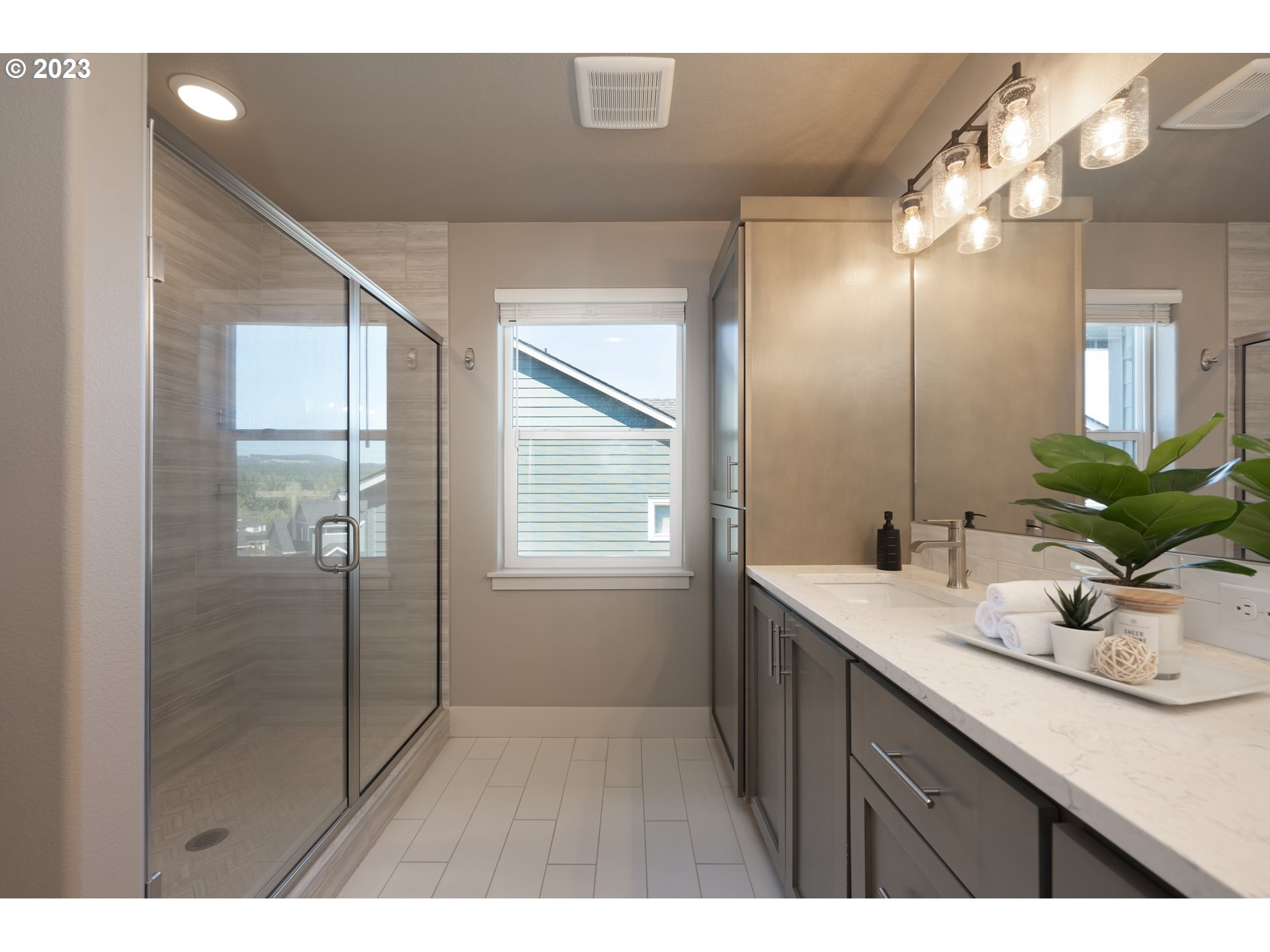 3743 Northwest 64th Avenue Camas, WA 98607 - Photo 24 of 35 a bathroom with a sink a vanity and a mirror