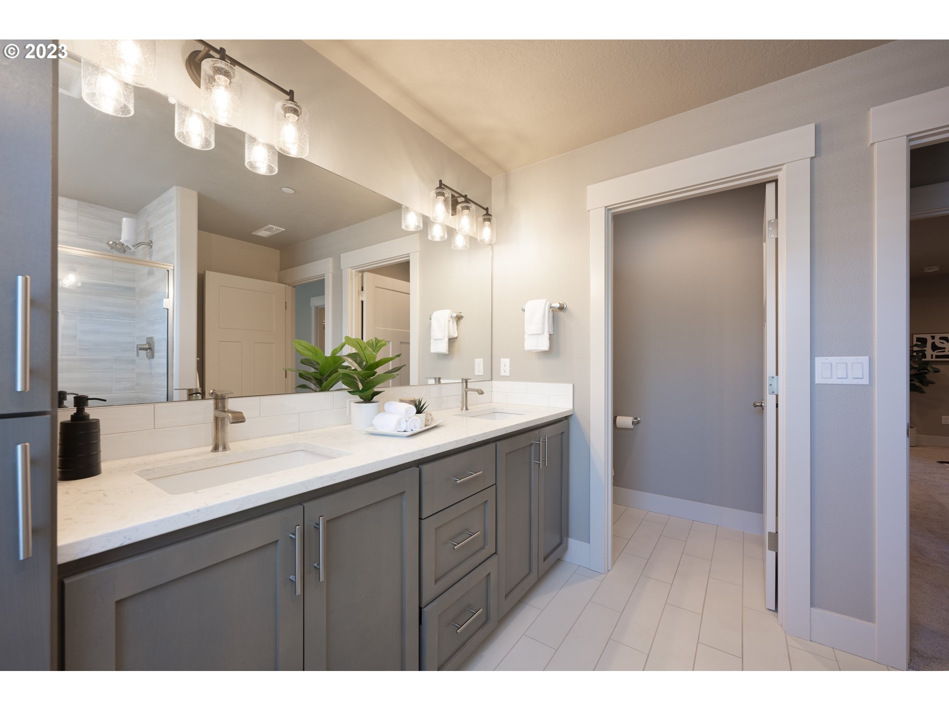 3743 Northwest 64th Avenue Camas, WA 98607 - Photo 25 of 35 a bathroom with a double vanity sink and a mirror