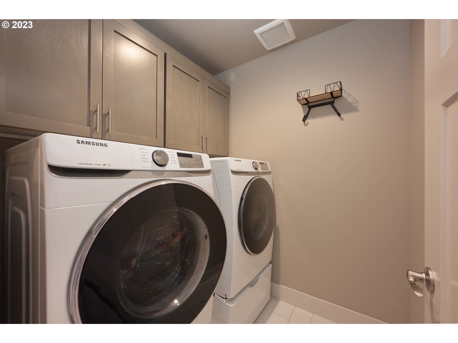 3743 Northwest 64th Avenue Camas, WA 98607 - Photo 30 of 35 a utility room with dryer and washer