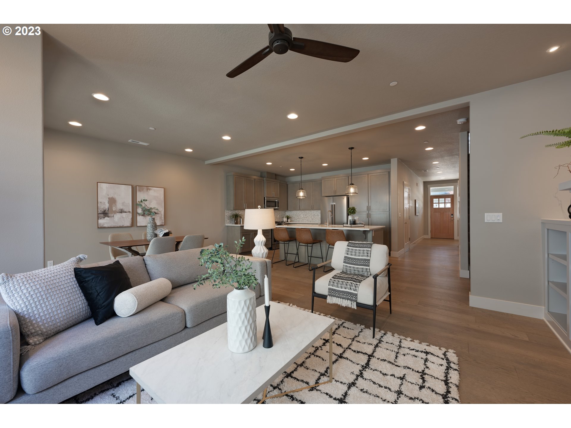 3743 Northwest 64th Avenue Camas, WA 98607 - Photo 8 of 35 a living room with furniture and a wooden floor