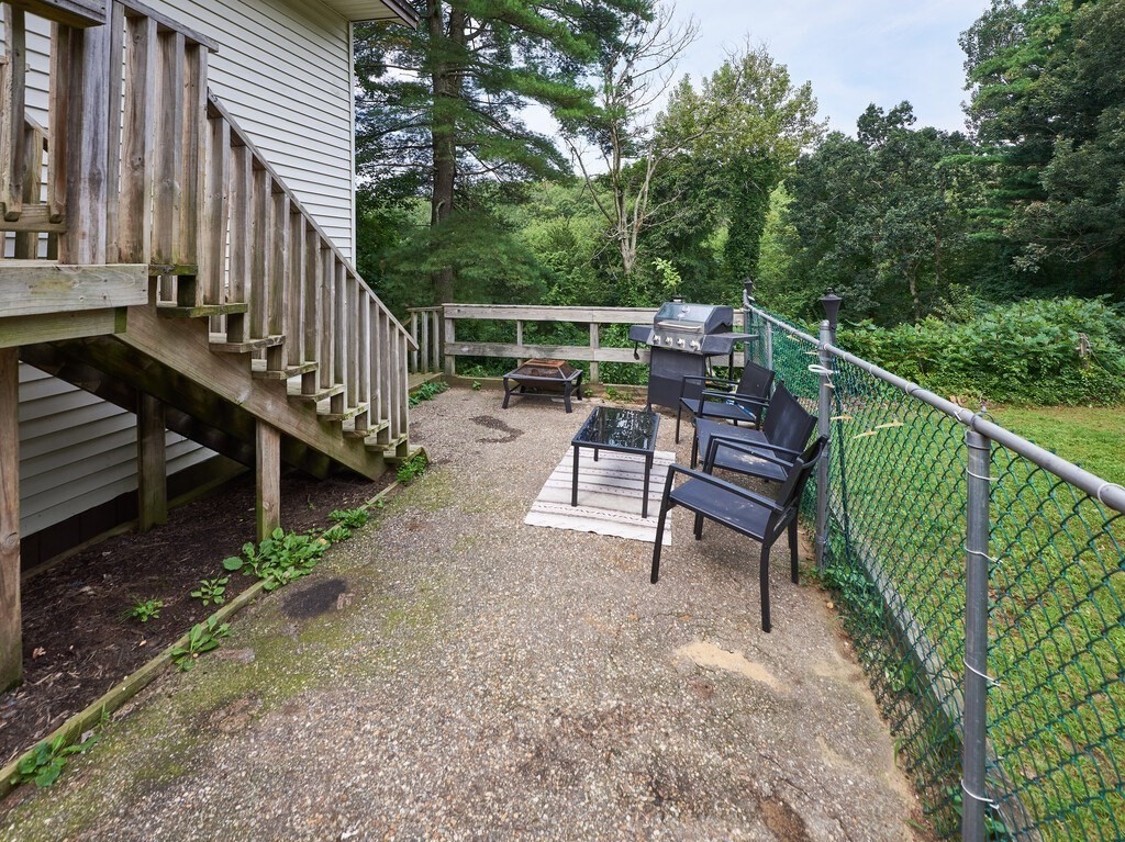 428 Keys Road Warren, MA 01585 - Photo 25 of 26 a view of a chair and table in the deck