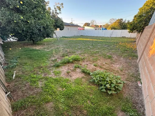 a view of a garden with an outdoor space