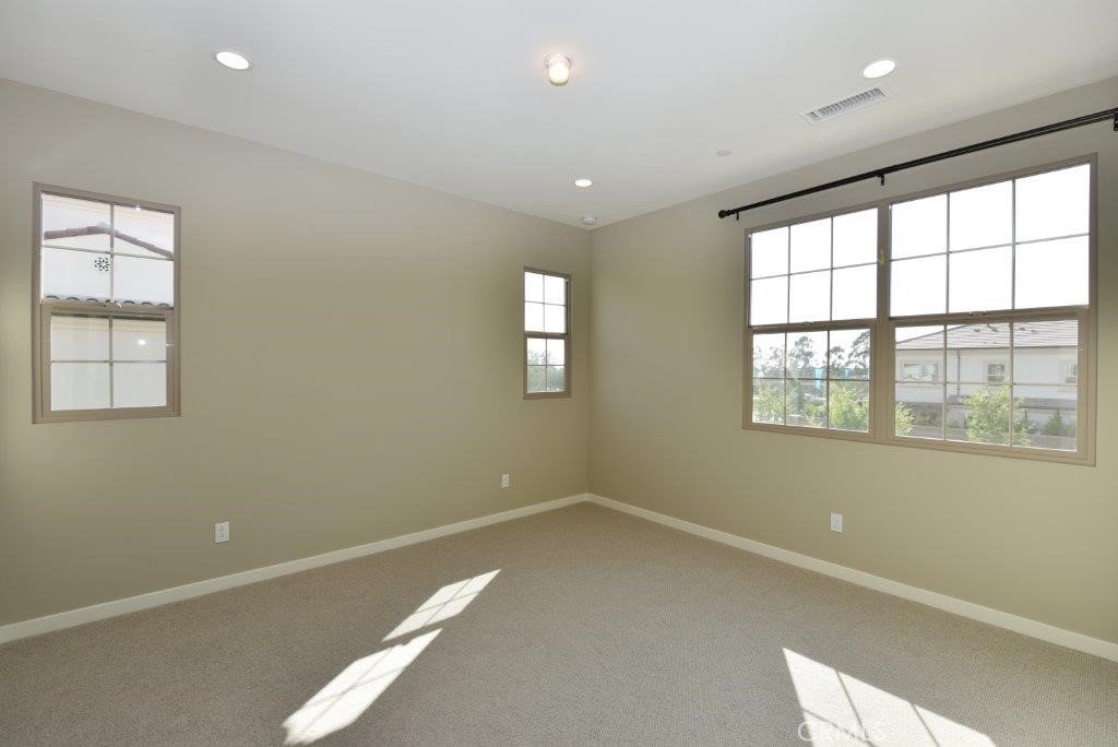 338 Floral View Irvine, CA 92618 - Photo 20 of 23 an empty room with windows