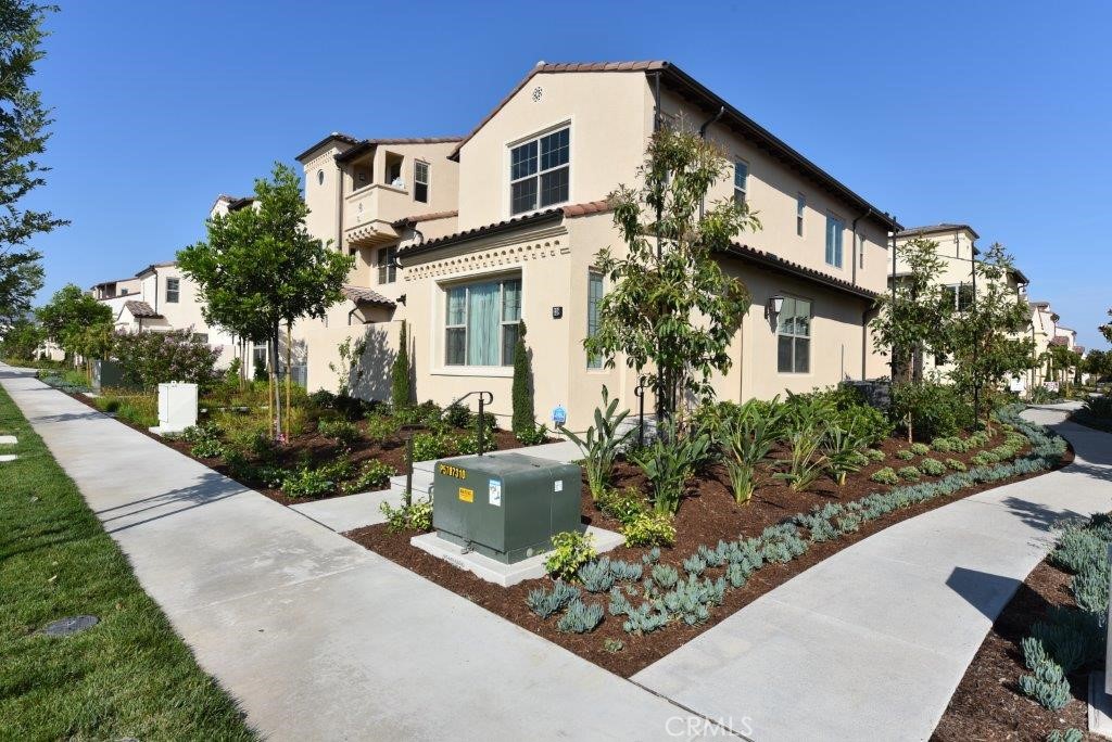 338 Floral View Irvine, CA 92618 - Photo 3 of 23 a front view of a house with garden