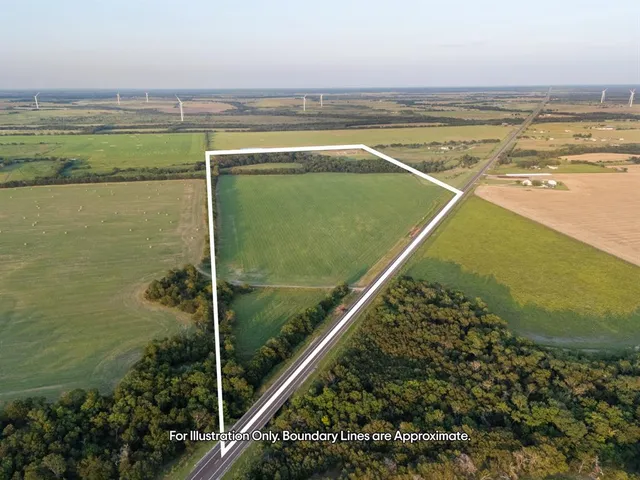 a view of an ocean and a houses