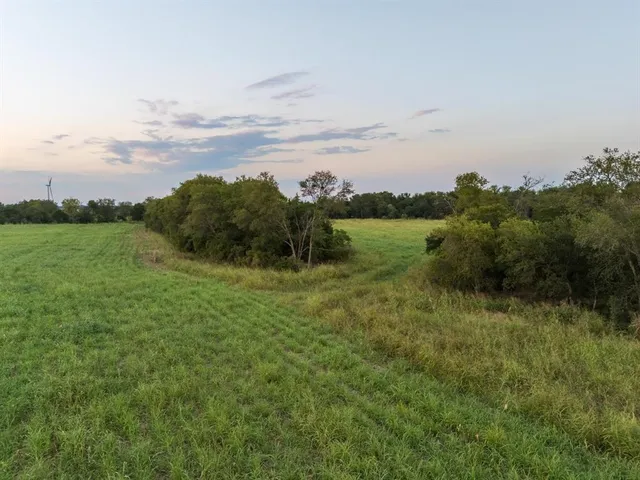 a view of a lake with a city