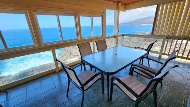 a view of a room with furniture wooden floor and window
