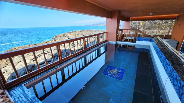 a view of balcony with ocean view