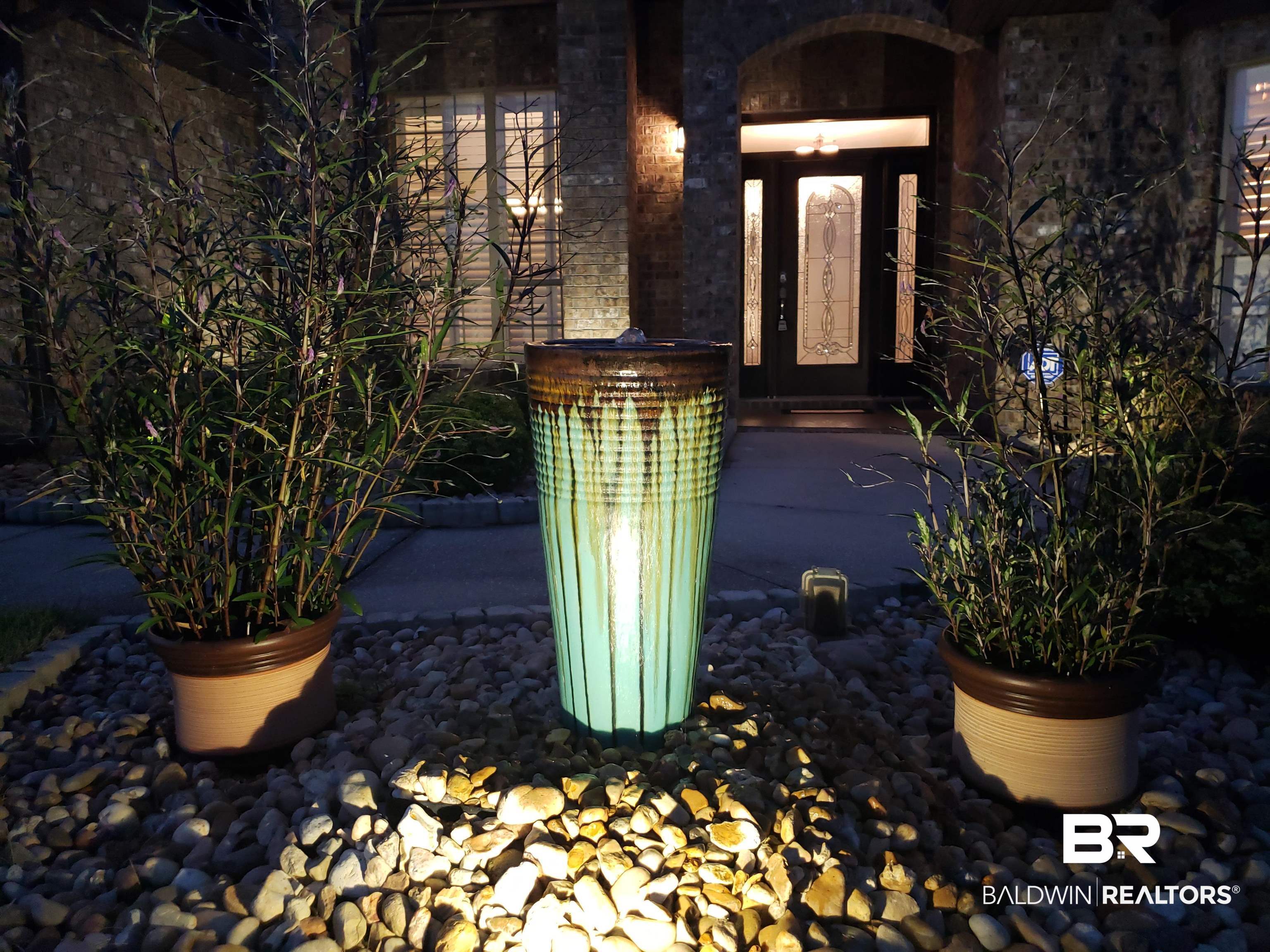 23373 Dundee Circle Foley, AL 36535 - Photo 5 of 34 Fountain with lights and Decorative Landscaping