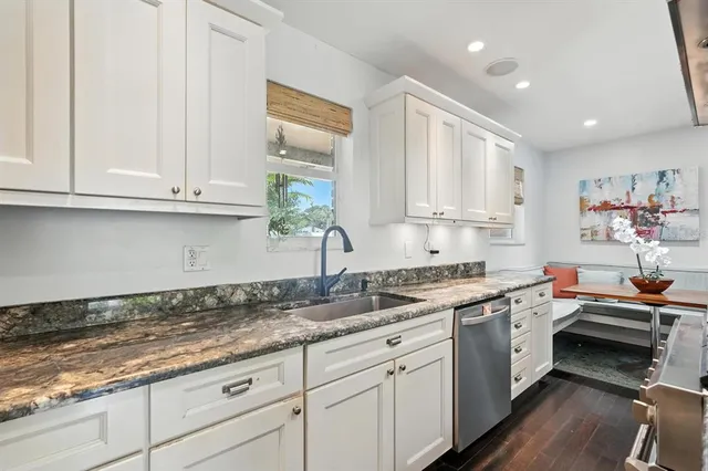 a view of balcony with wooden floor and fence