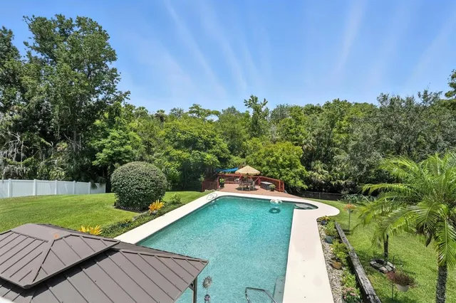 a view of a backyard with plants