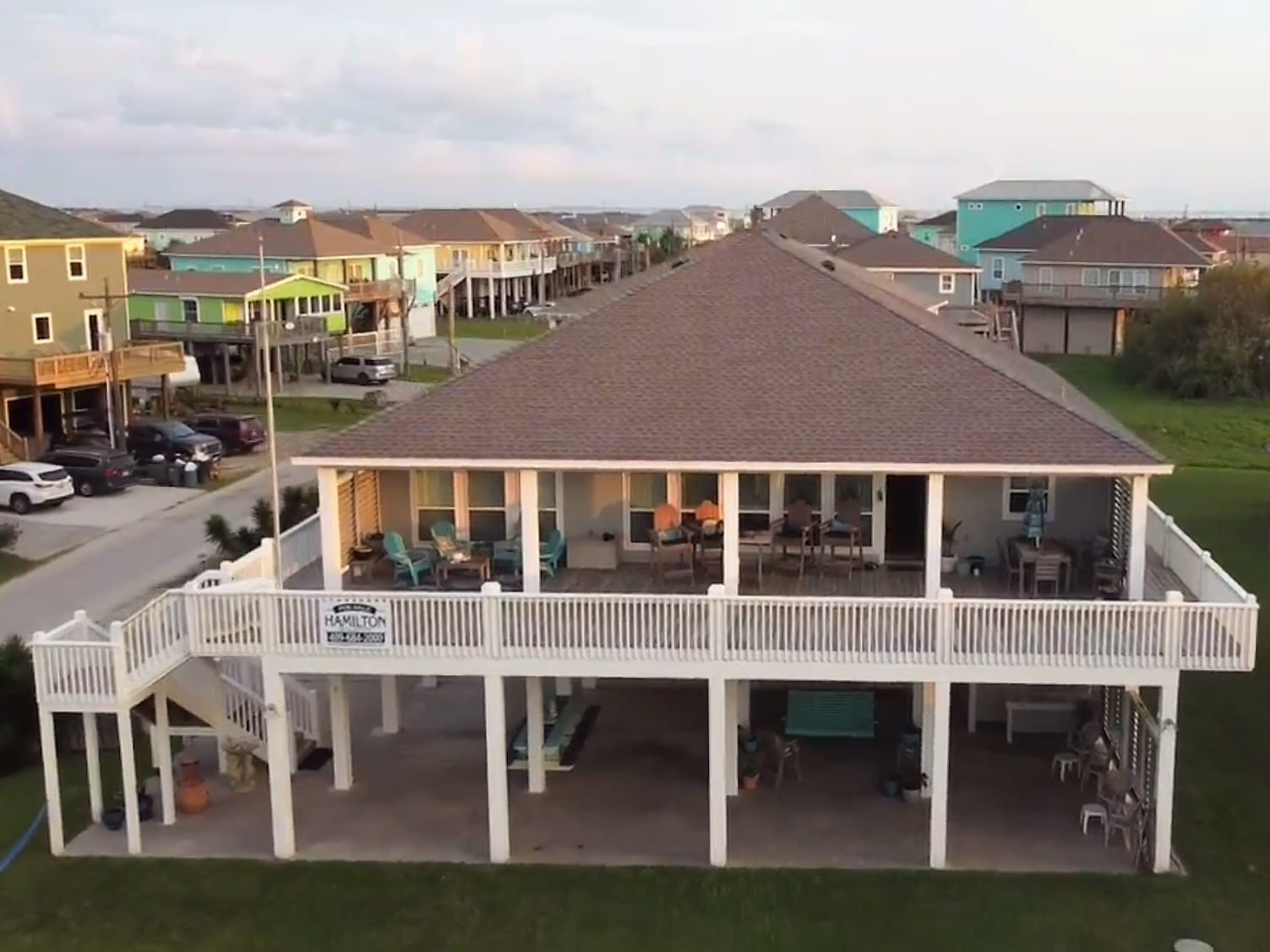 956 South Redfish Crystal Beach, TX 77650 - Photo 4 of 20 a view of a large building with a balcony