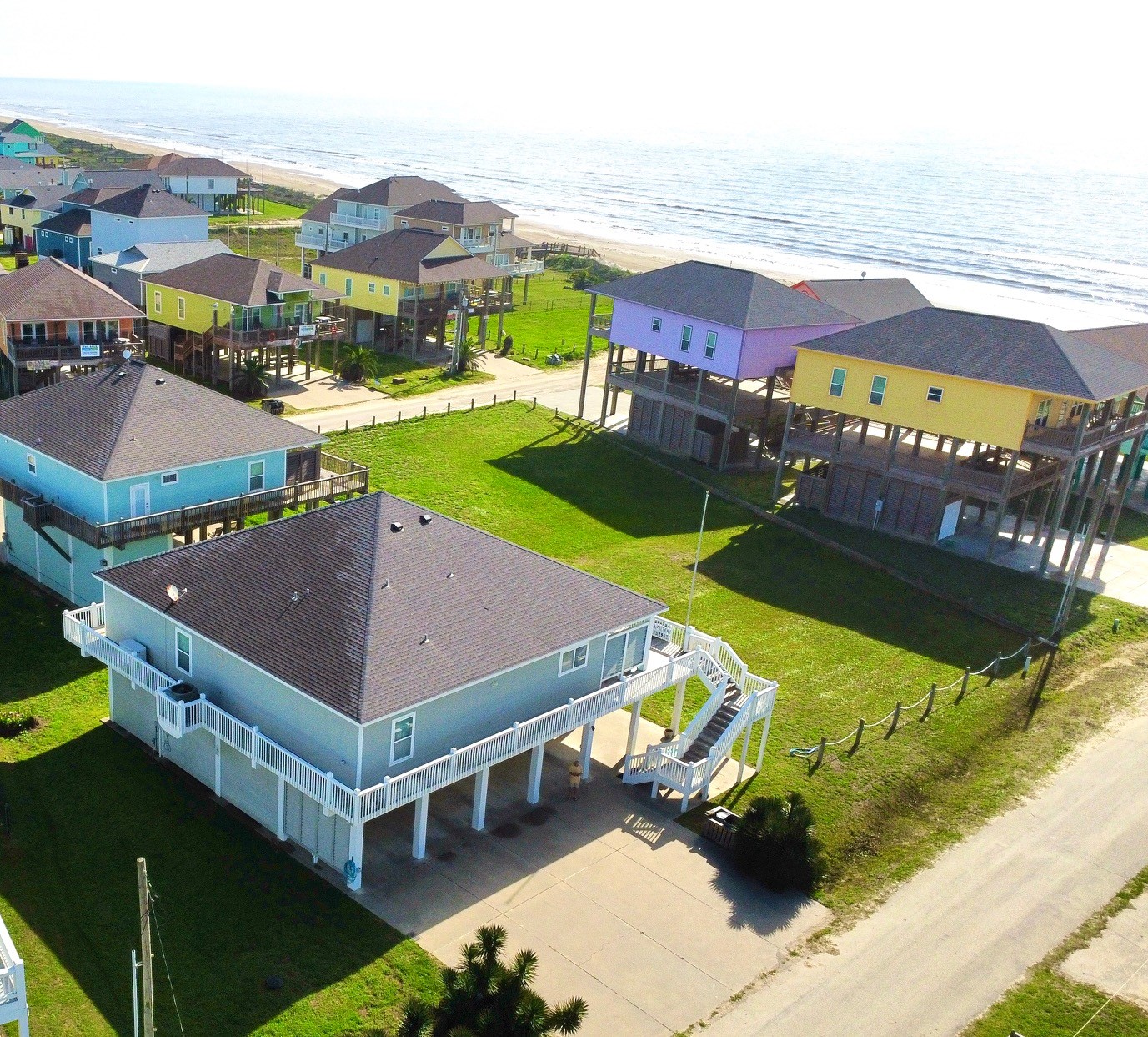 956 South Redfish Crystal Beach, TX 77650 - Photo 5 of 20 an aerial view of a house with a garden