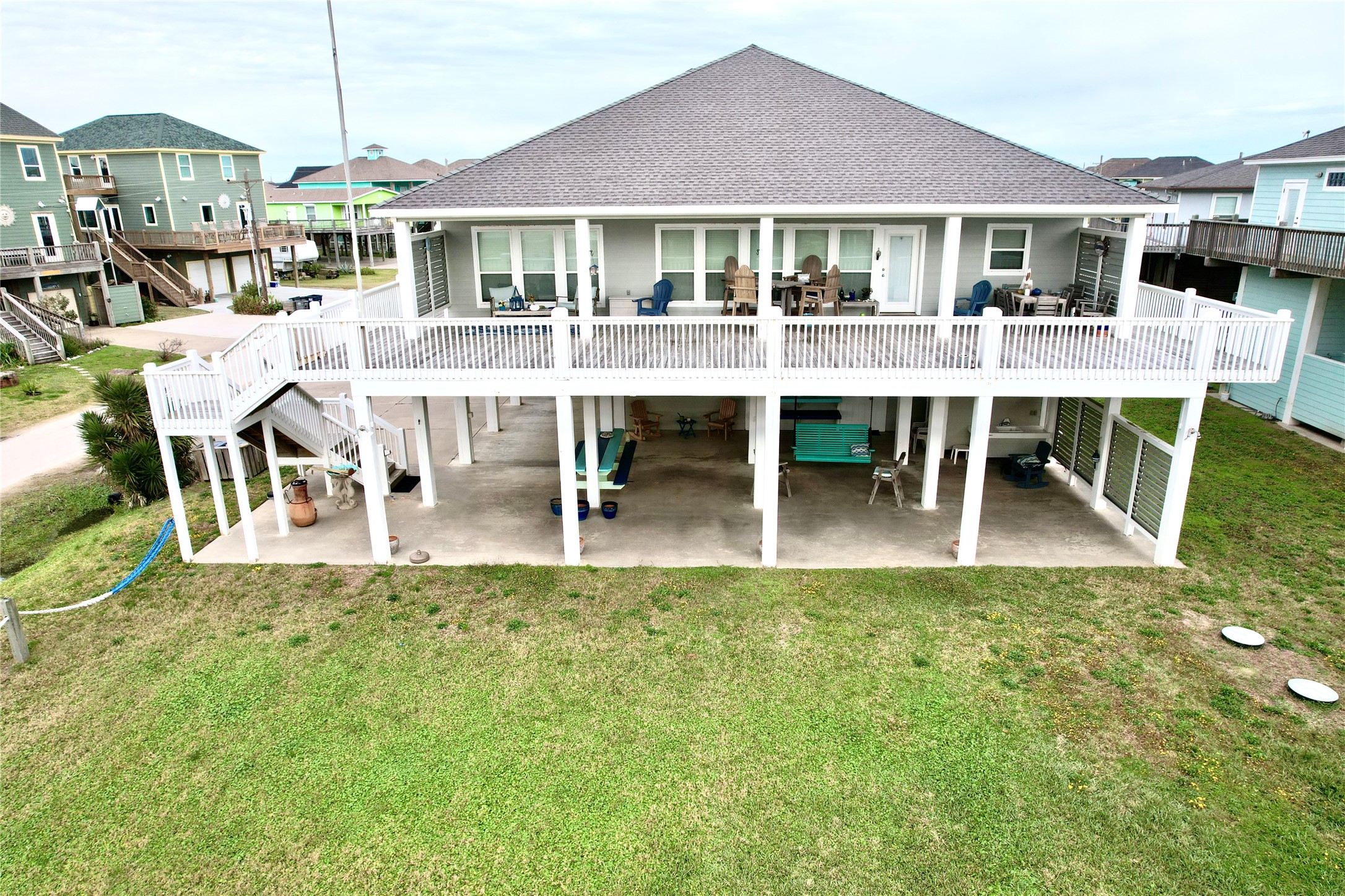 956 South Redfish Crystal Beach, TX 77650 - Photo 6 of 20 a view of a house with a swimming pool and sitting area