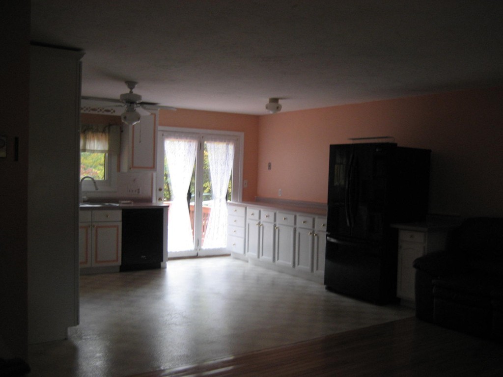 53 Breakneck Road Sturbridge, MA 01566 - Photo 16 of 22 a view of a kitchen with a refrigerator and a stove top oven