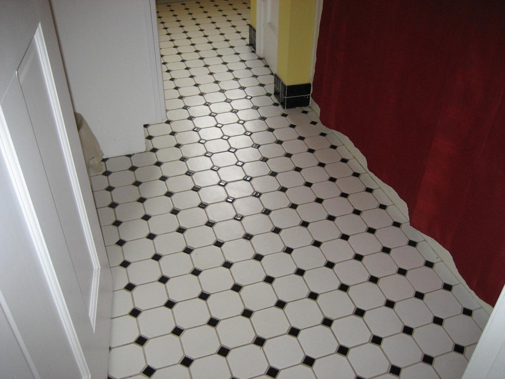 53 Breakneck Road Sturbridge, MA 01566 - Photo 18 of 22 a bathroom with a black white checkered and white checkered floor