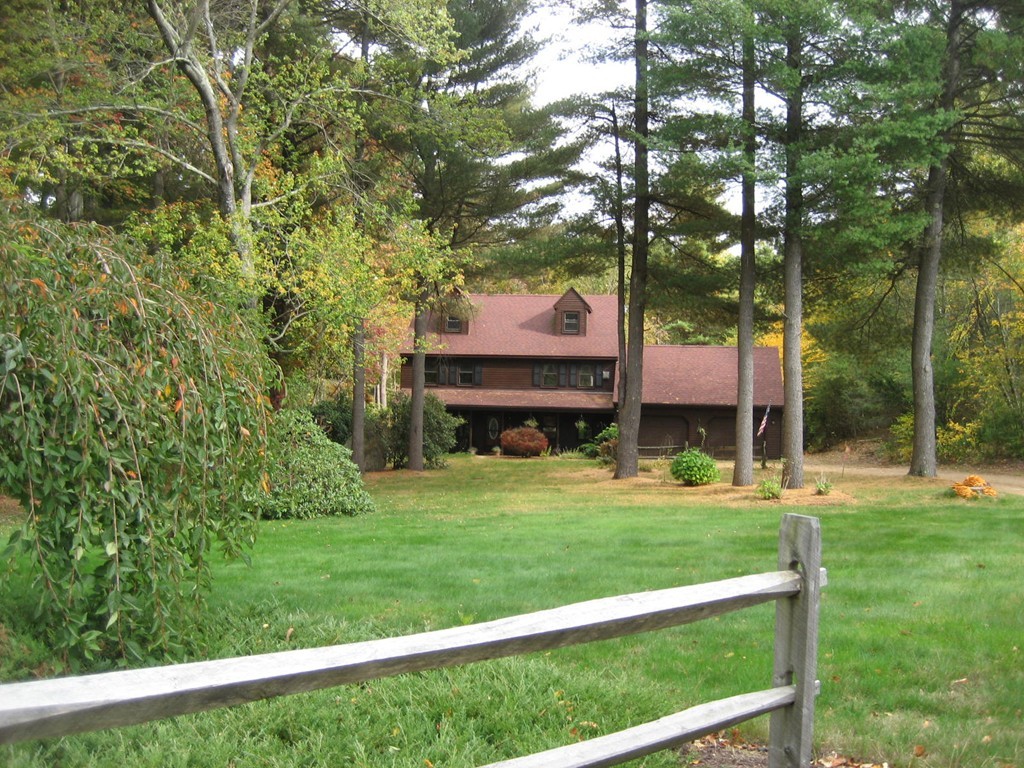 53 Breakneck Road Sturbridge, MA 01566 - Photo 3 of 22 a front view of a house with a yard