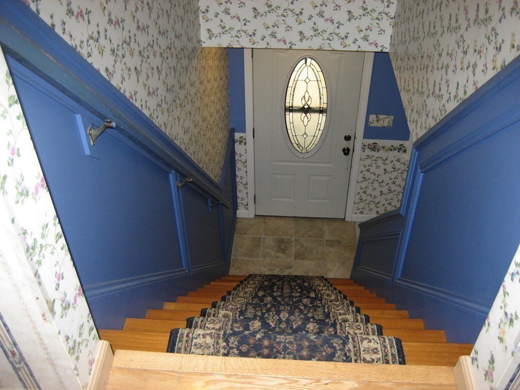 53 Breakneck Road Sturbridge, MA 01566 - Photo 9 of 22 a view of a entryway door with wooden floor