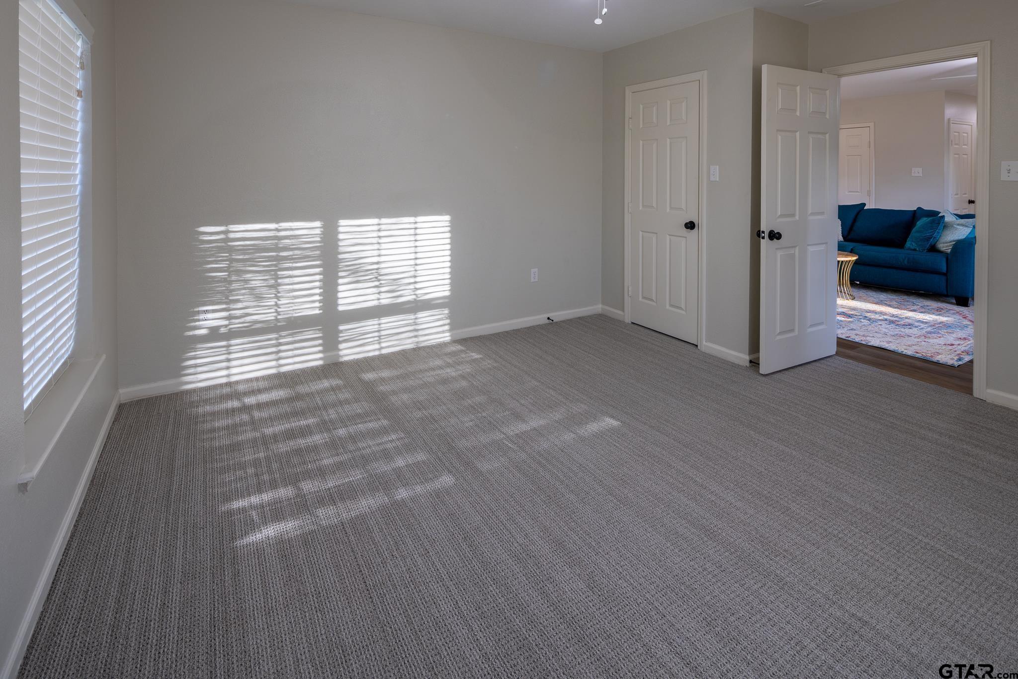 2802 Pollard Drive Tyler, TX 75701 - Photo 23 of 38 a view of an empty room with a window