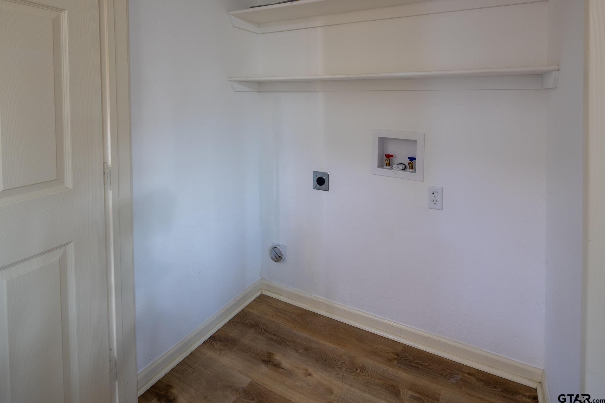 2802 Pollard Drive Tyler, TX 75701 - Photo 24 of 38 a view of small space with racks on the wall