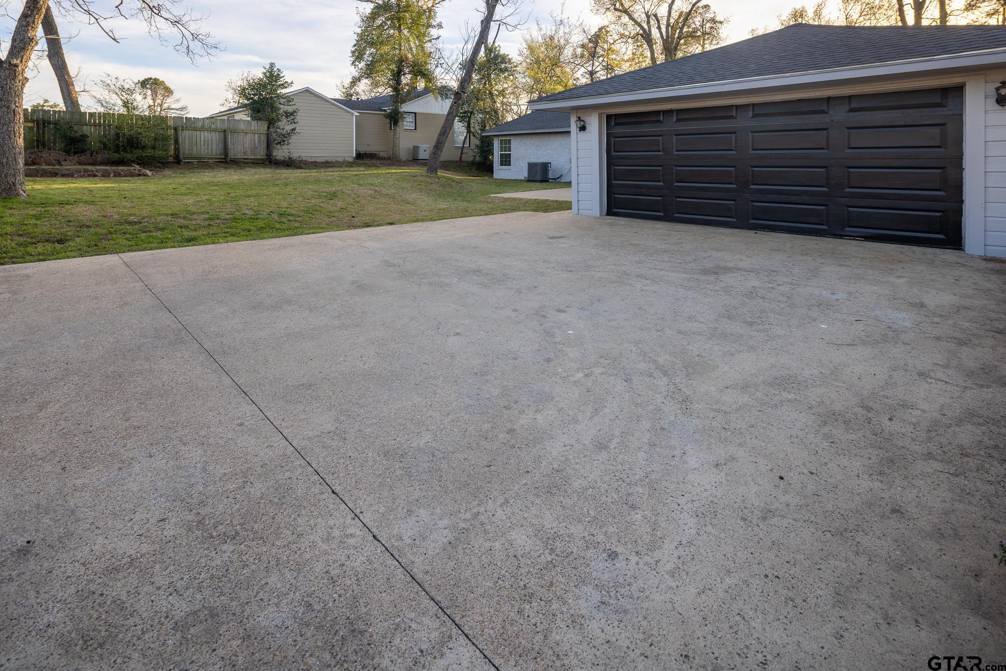 2802 Pollard Drive Tyler, TX 75701 - Photo 31 of 38 front view of a house with a yard