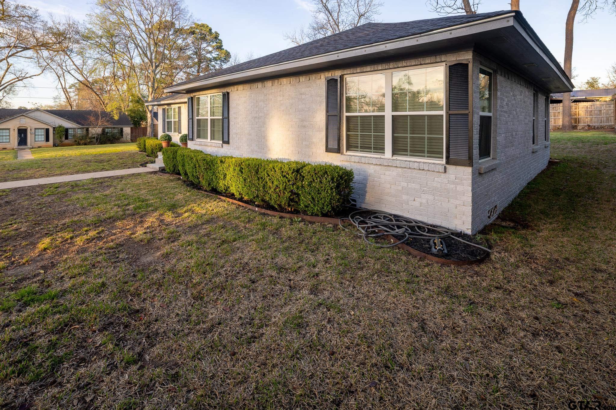2802 Pollard Drive Tyler, TX 75701 - Photo 32 of 38 a view of a house with a yard