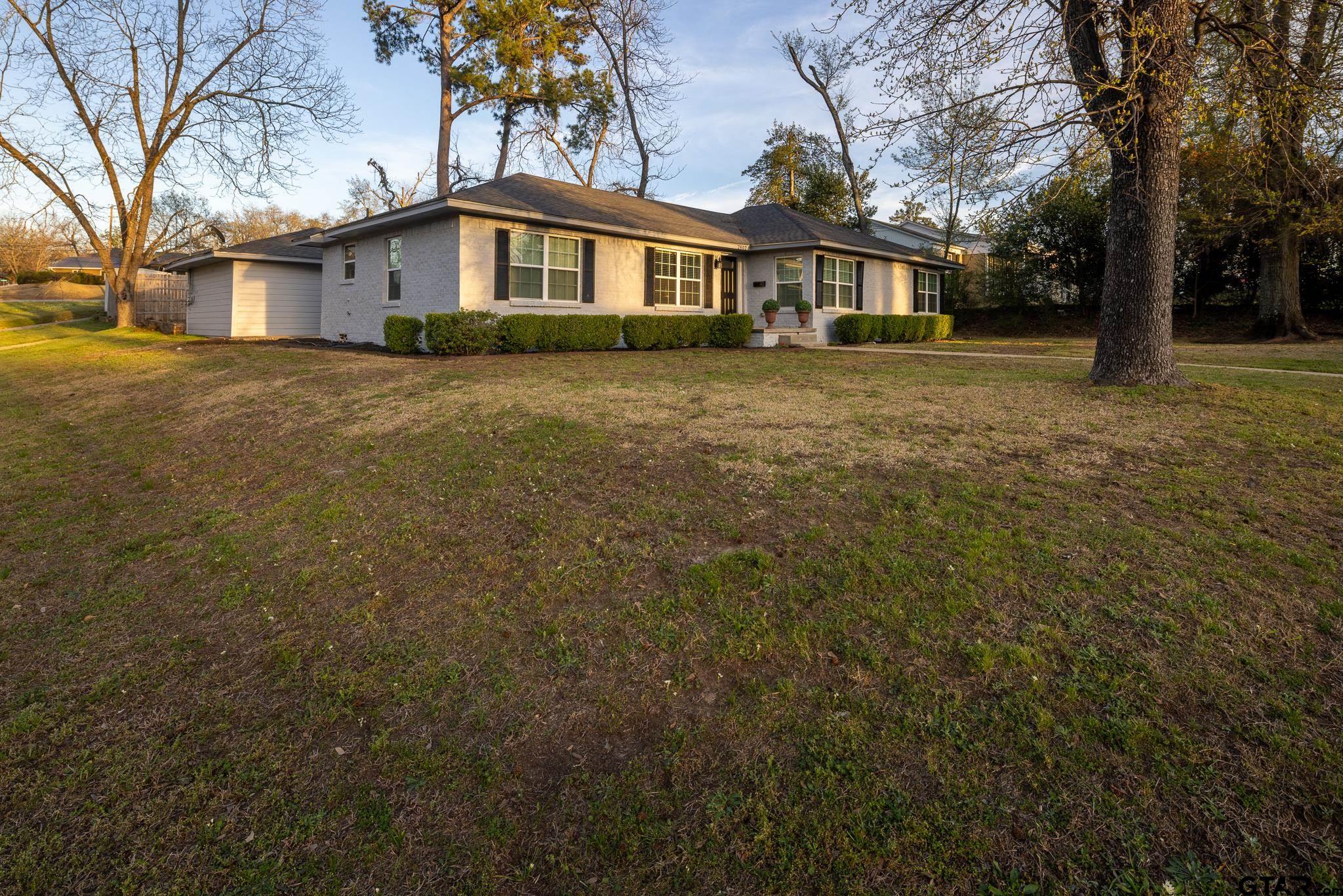 2802 Pollard Drive Tyler, TX 75701 - Photo 33 of 38 a view of a yard in front of a house