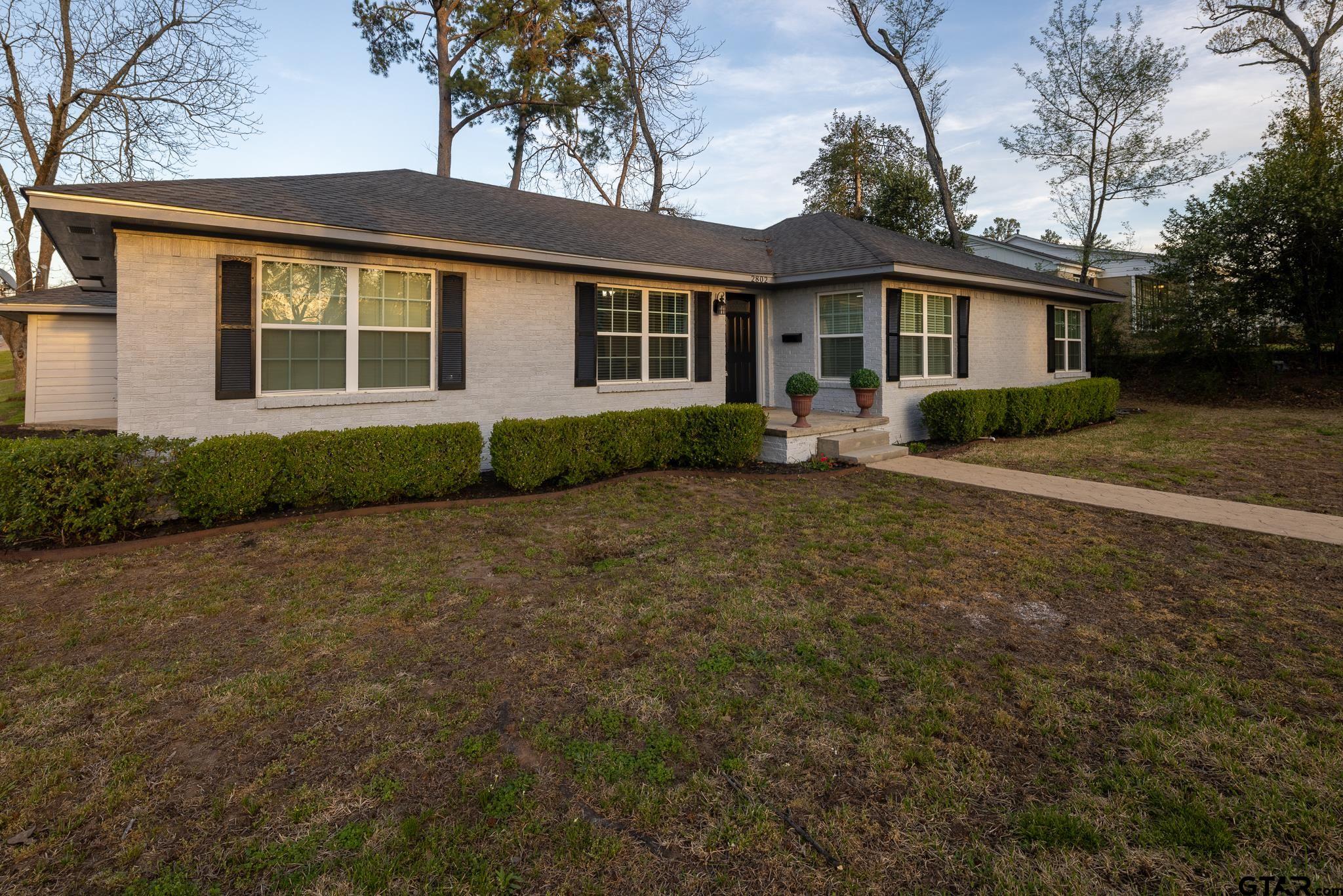 2802 Pollard Drive Tyler, TX 75701 - Photo 37 of 38 a view of a yard in front of a house
