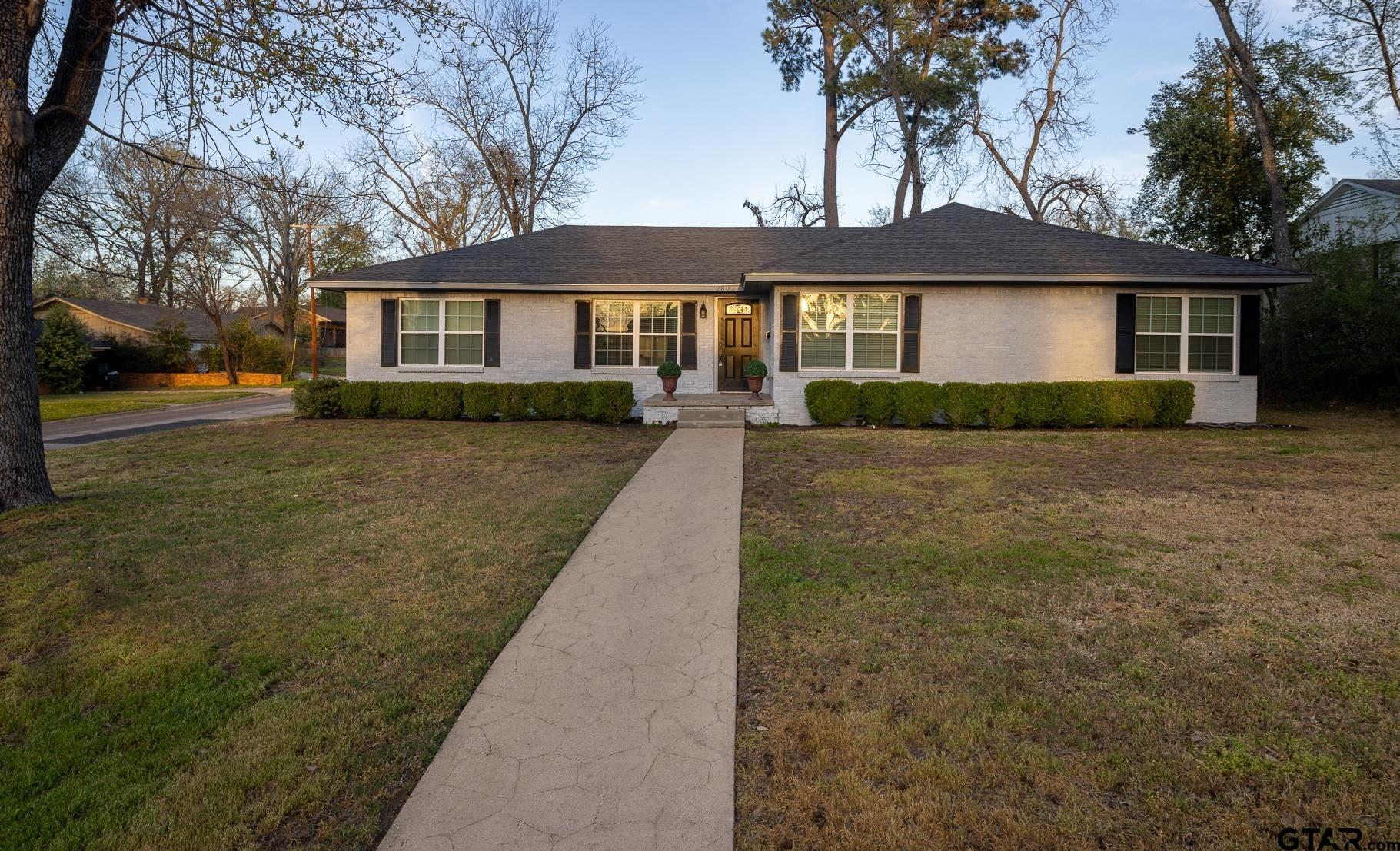 2802 Pollard Drive Tyler, TX 75701 - Photo 38 of 38 front view of a house with a yard