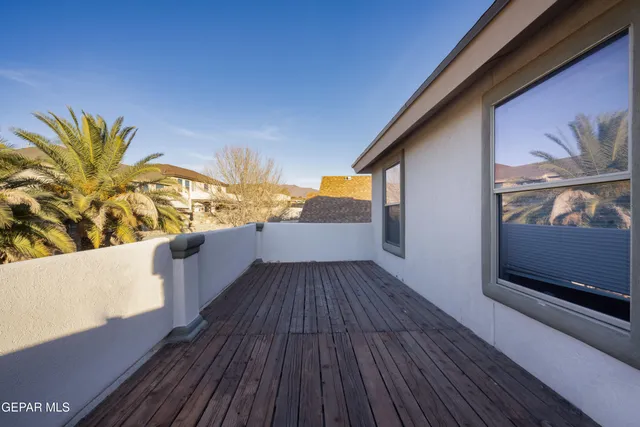 a view of outdoor space with wooden floor