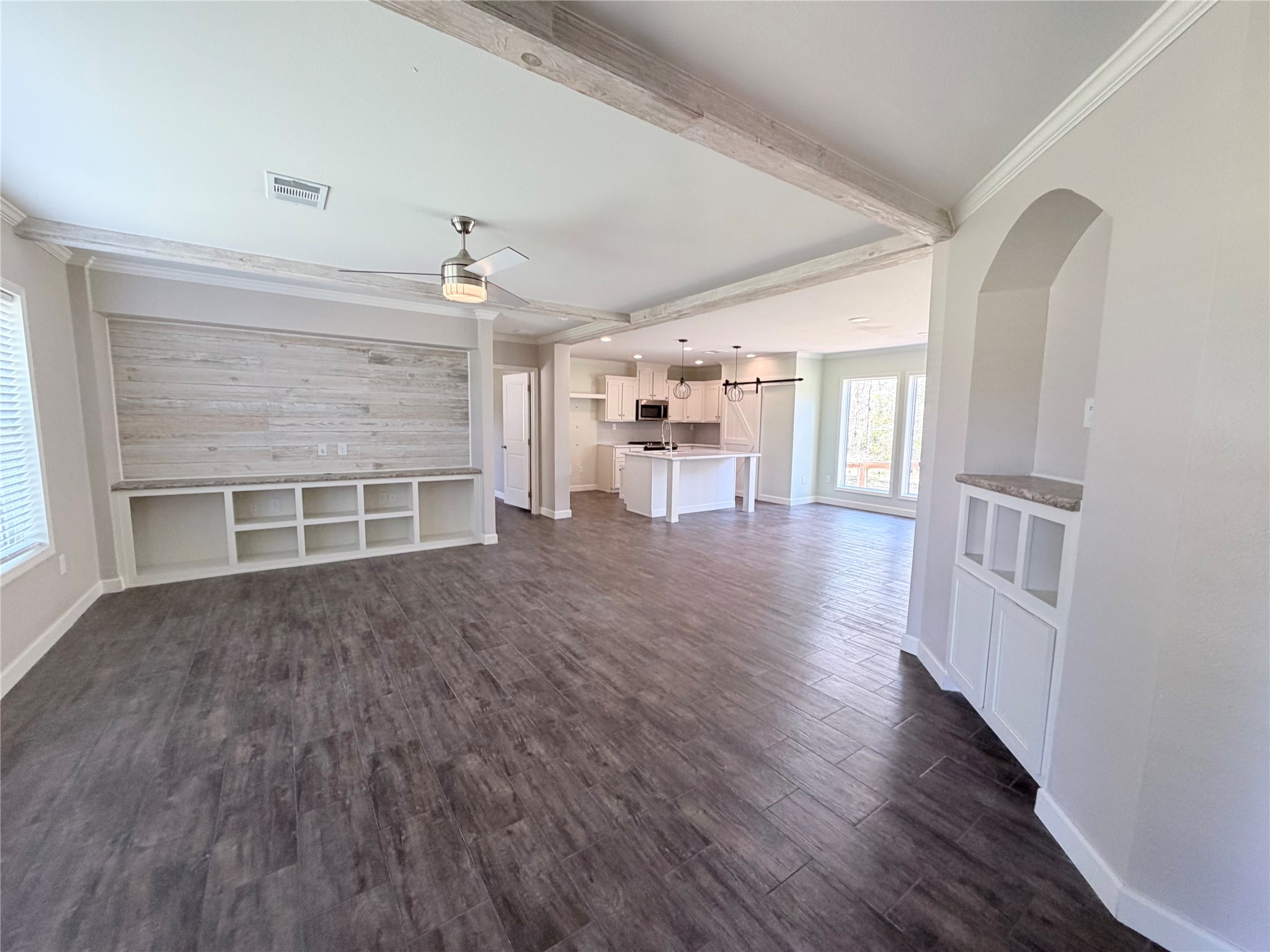 59 Forgotten Road Richards, TX 77873 - Photo 2 of 21 wooden floor in an empty room with a fireplace